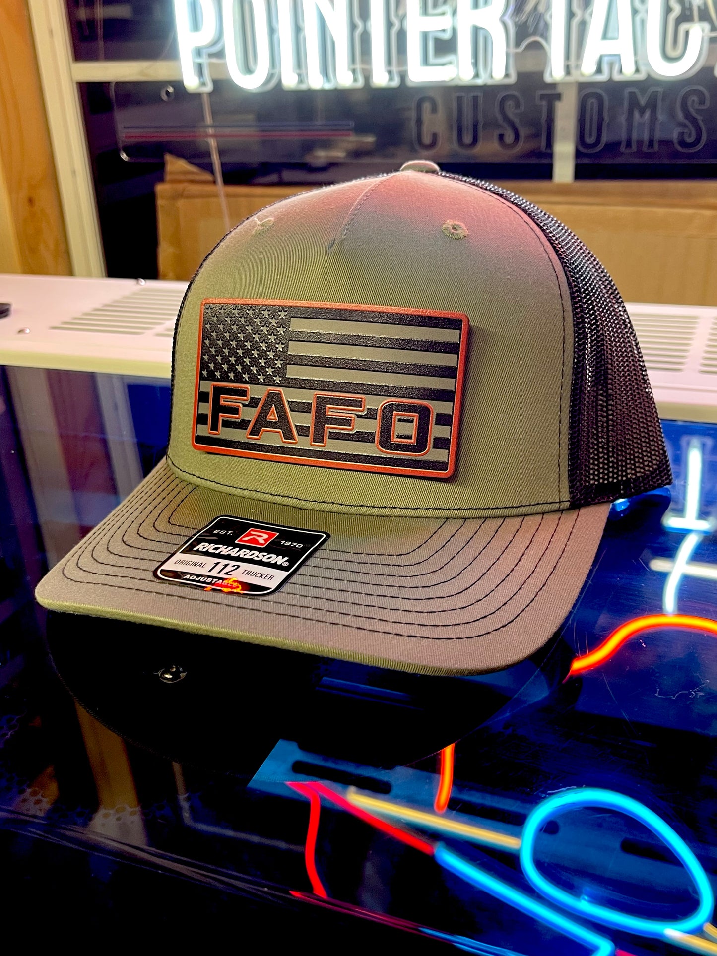 Shop the FAFO Richardson 112 Trucker Hat 🧢 | Tactical camo snapback with American Flag patch | Rugged, patriotic, and built for bold Americans.