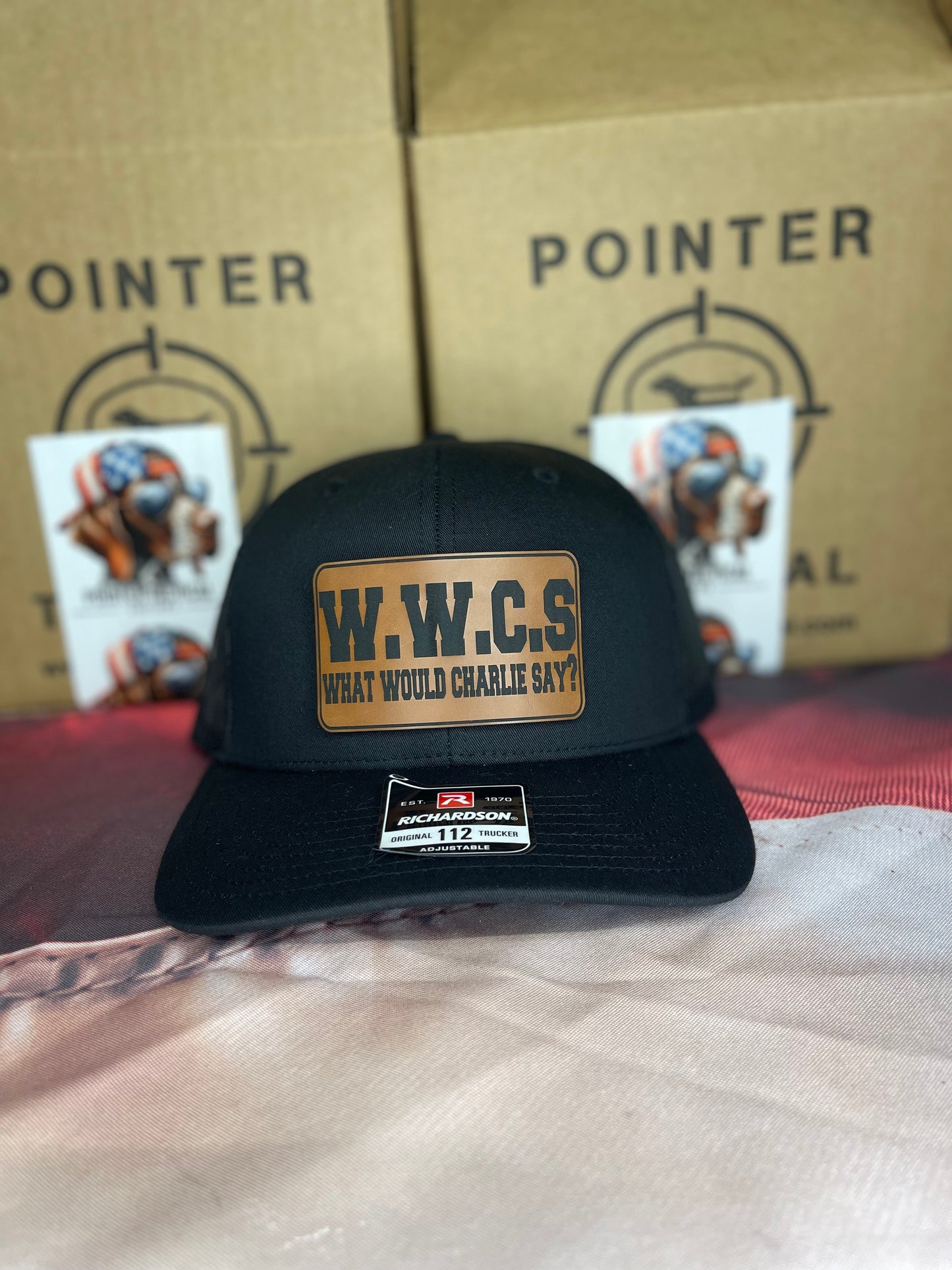 W.W.C.S. – What Would Charlie Say? Leather Patch Trucker Hat (Richardson 112)
