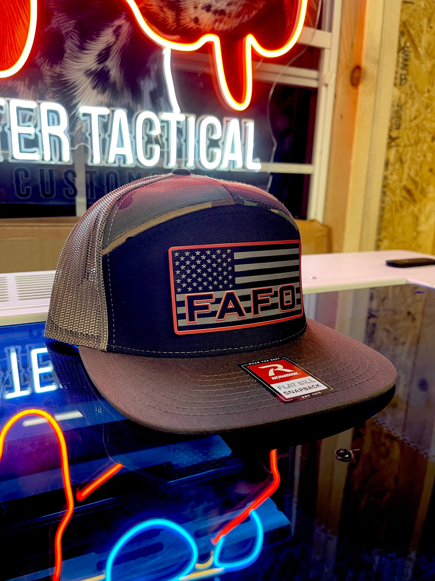 Shop the FAFO Richardson 112 Trucker Hat 🧢 | Tactical camo snapback with American Flag patch | Rugged, patriotic, and built for bold Americans.