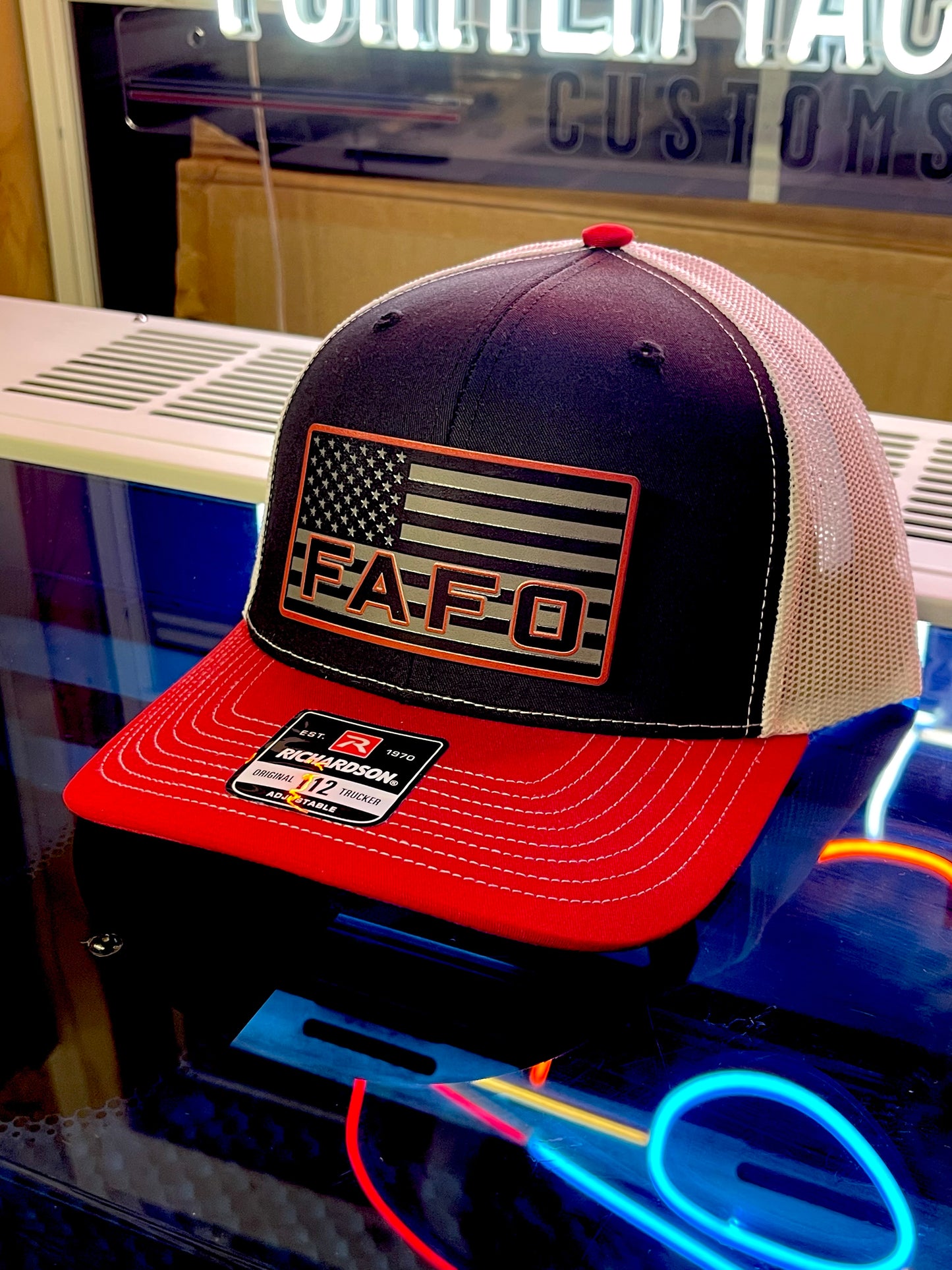 Shop the FAFO Richardson 112 Trucker Hat 🧢 | Tactical camo snapback with American Flag patch | Rugged, patriotic, and built for bold Americans.