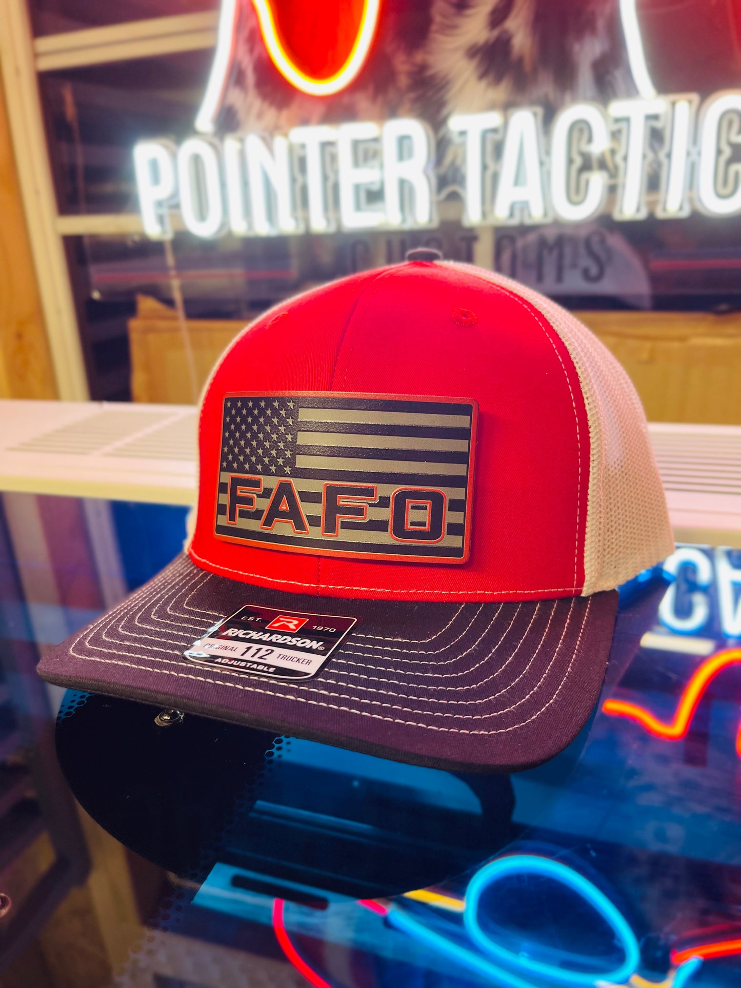 Shop the FAFO Richardson 112 Trucker Hat 🧢 | Tactical camo snapback with American Flag patch | Rugged, patriotic, and built for bold Americans.