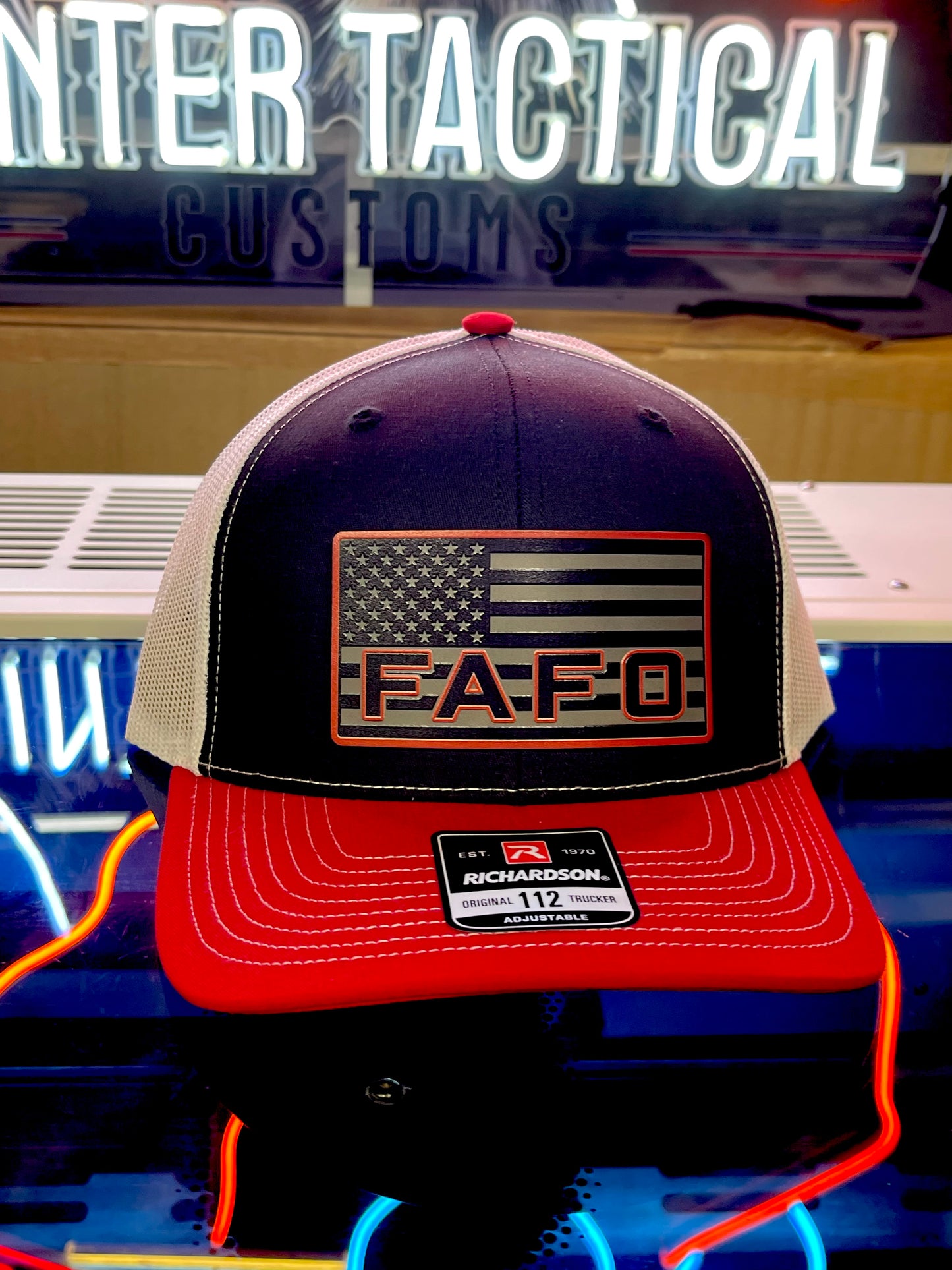 Shop the FAFO Richardson 112 Trucker Hat 🧢 | Tactical camo snapback with American Flag patch | Rugged, patriotic, and built for bold Americans.