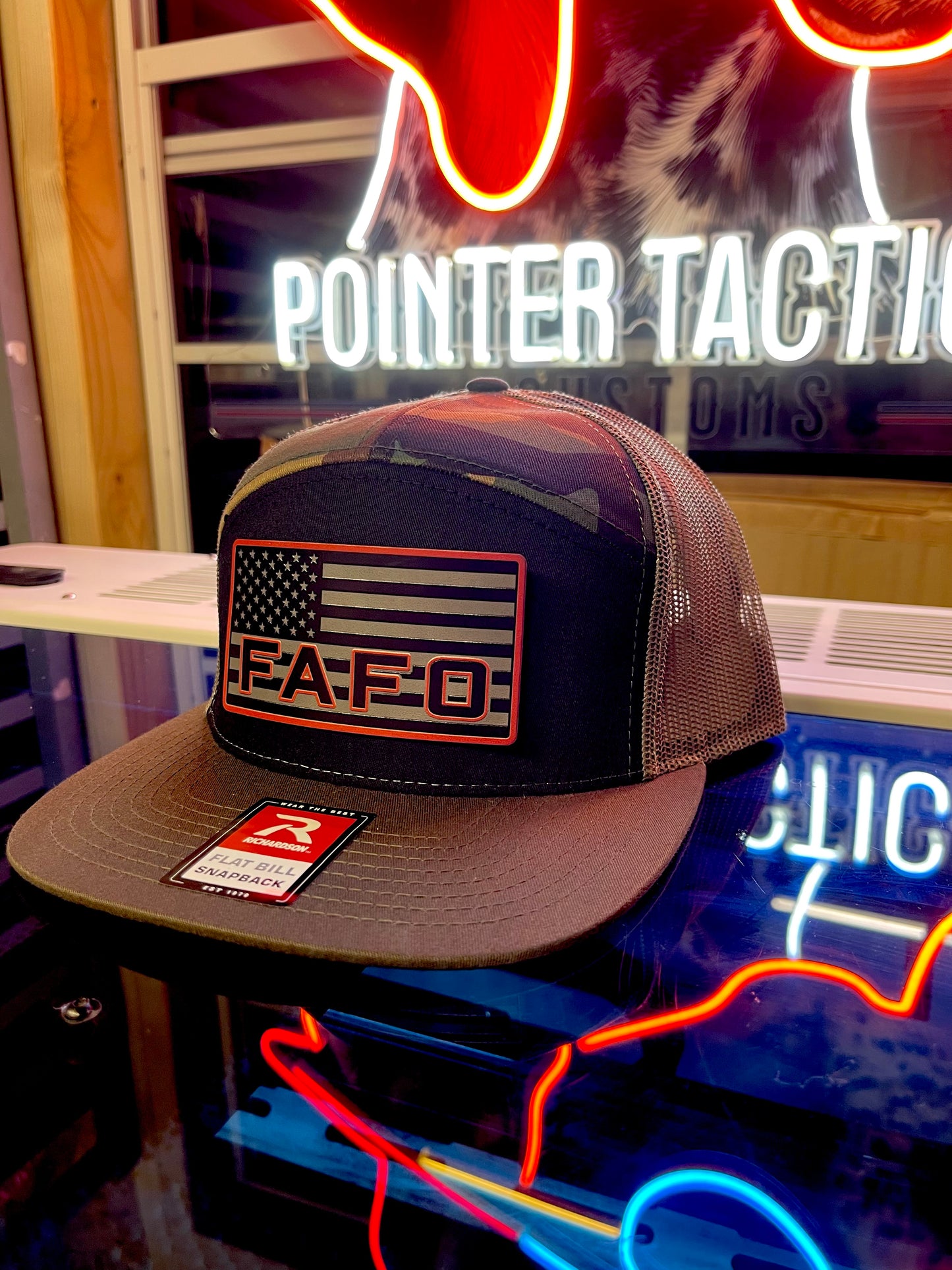 Shop the FAFO Richardson 112 Trucker Hat 🧢 | Tactical camo snapback with American Flag patch | Rugged, patriotic, and built for bold Americans.