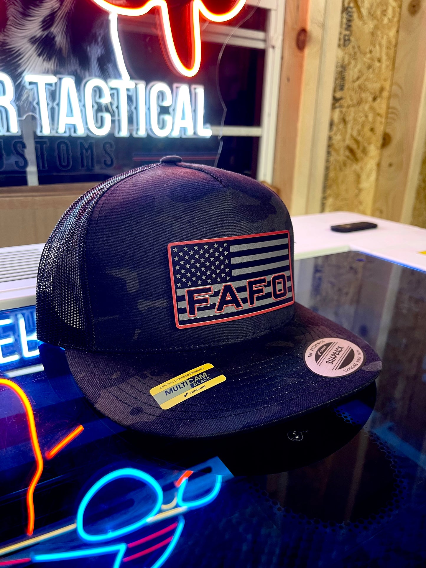 Shop the FAFO Richardson 112 Trucker Hat 🧢 | Tactical camo snapback with American Flag patch | Rugged, patriotic, and built for bold Americans.