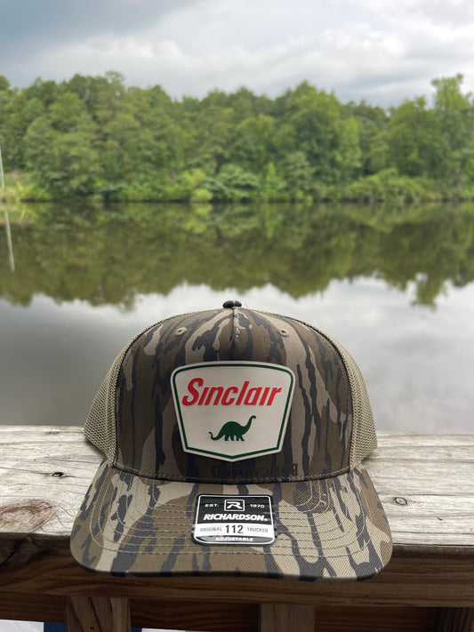 Sinclair Bottomland Camo Trucker Hat
