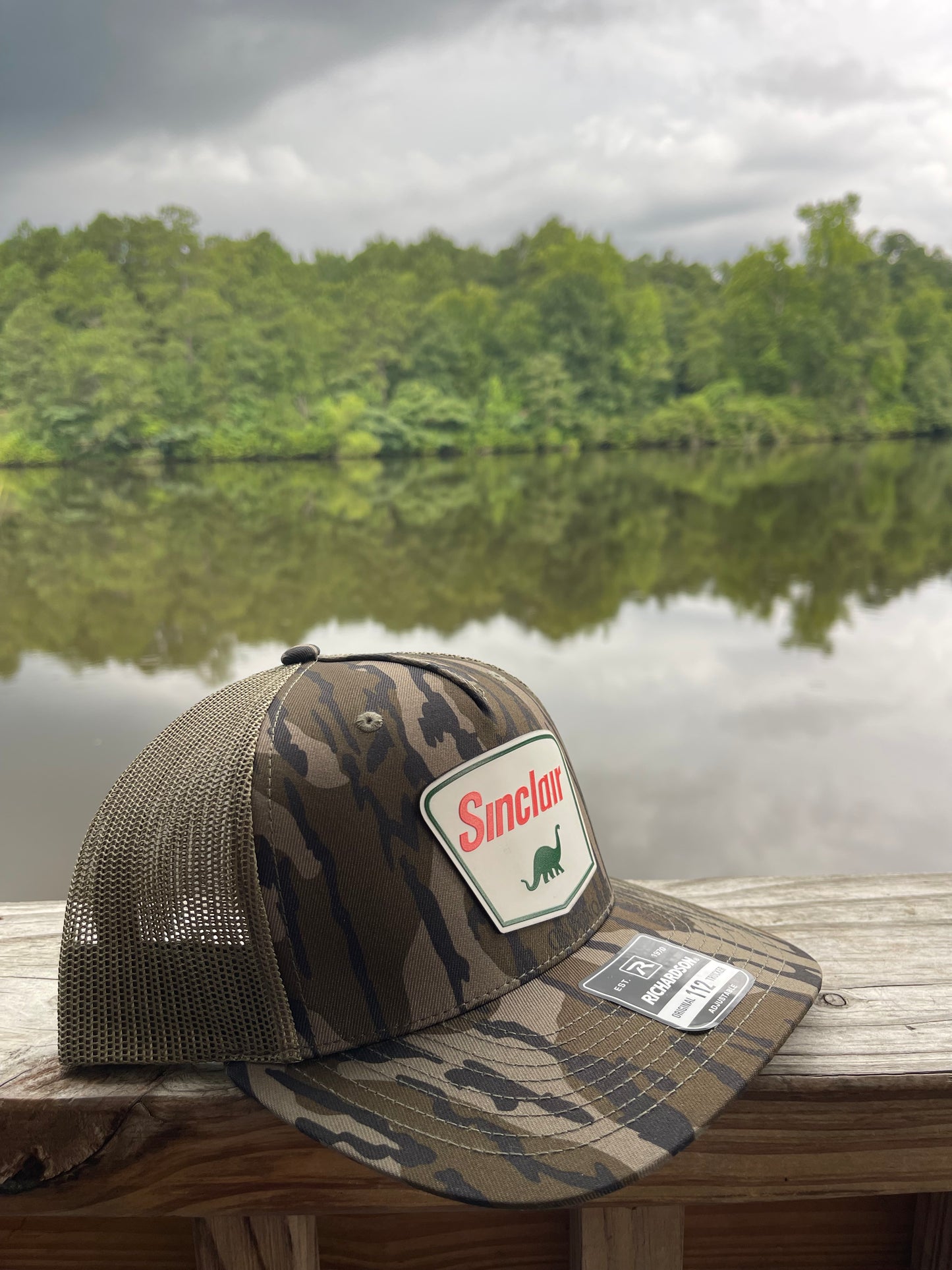 Sinclair Bottomland Camo Trucker Hat